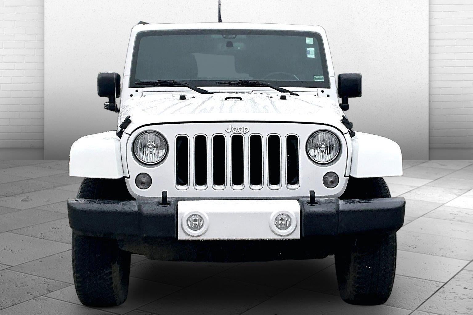 Used 2016 Jeep Wrangler Unlimited Sahara with VIN 1C4BJWEG9GL168338 for sale in Kansas City