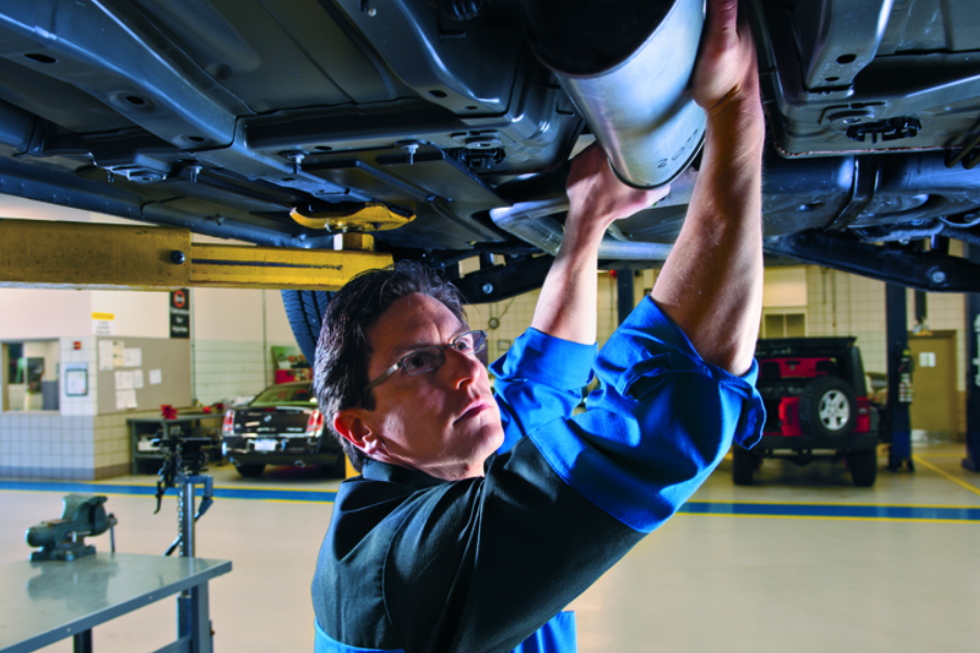 Cable Dahmer doing an exhaust repair